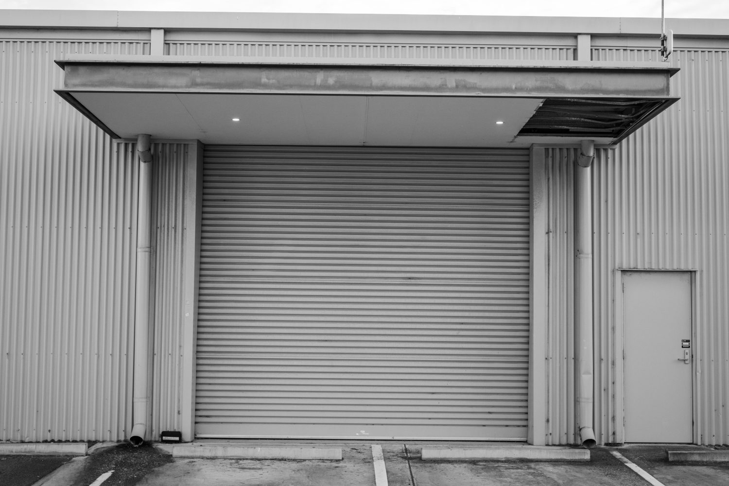 Garage métal toit plat : quel modèle choisir ?